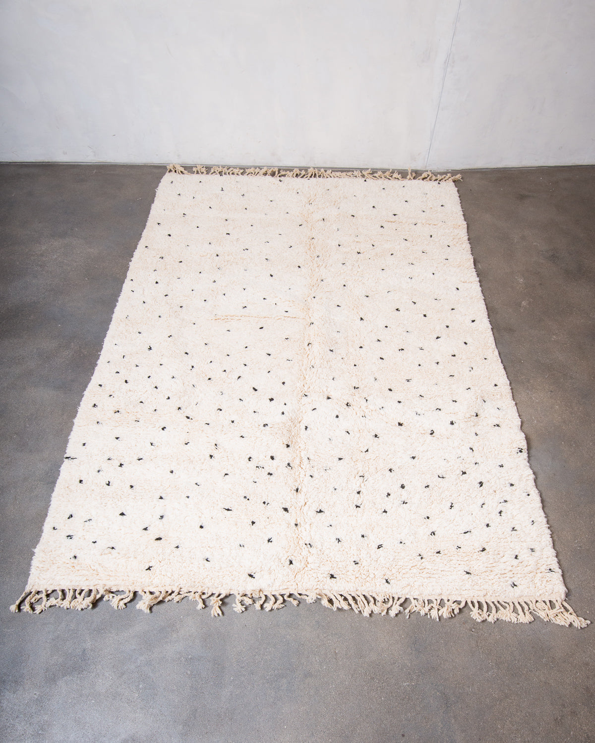 Modern, designer, handcrafted Berber rug from Morocco. Beniourain carpet with beautiful colours and patterns and fluffy wool texture.